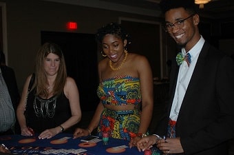 People having fun at a blackjack table party in Baltimore